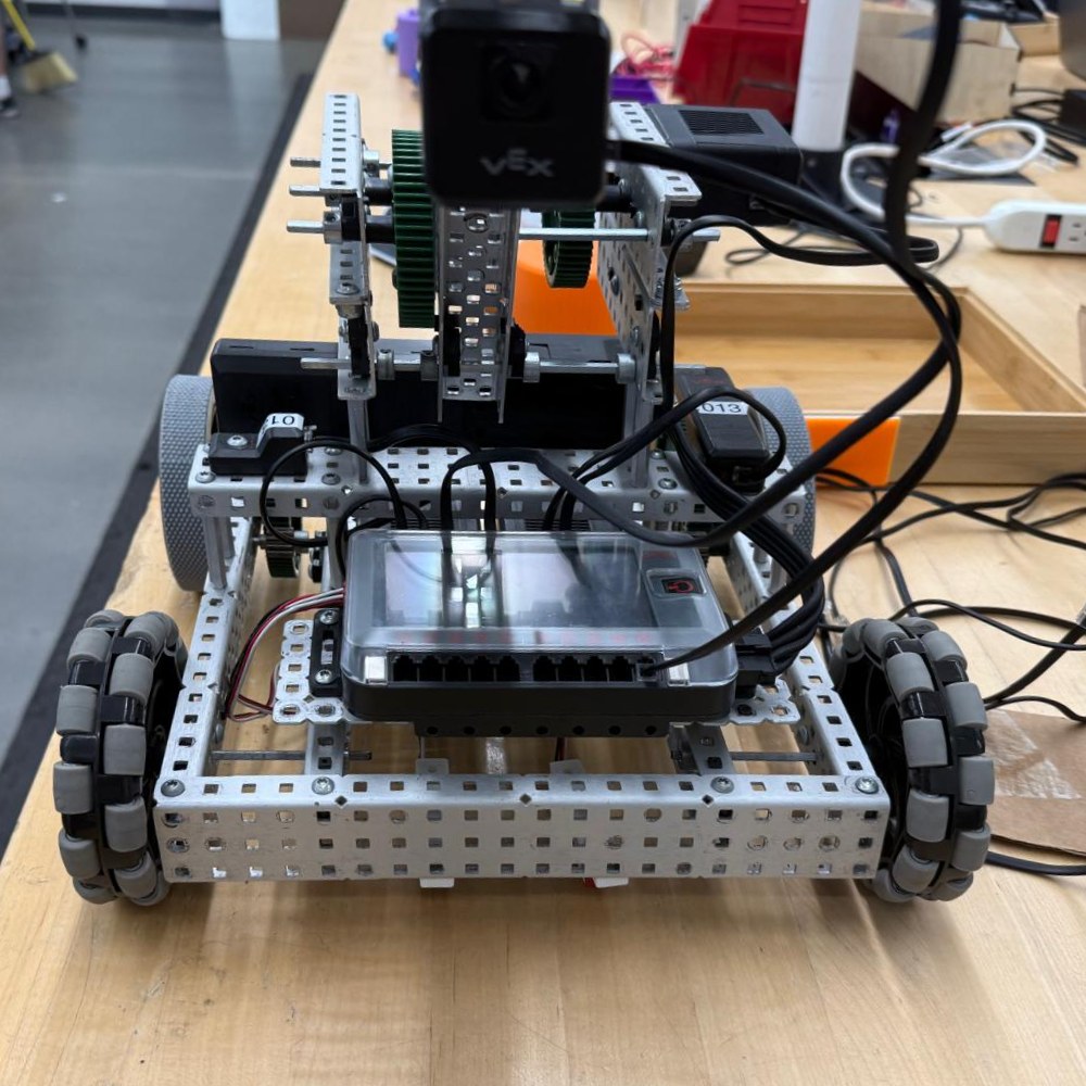 Front view of the VEX V5 fruit-harvesting robot with its camera mounted on top
